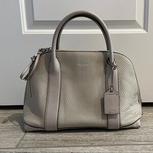 Elegant Coach Cream Leather Handbag